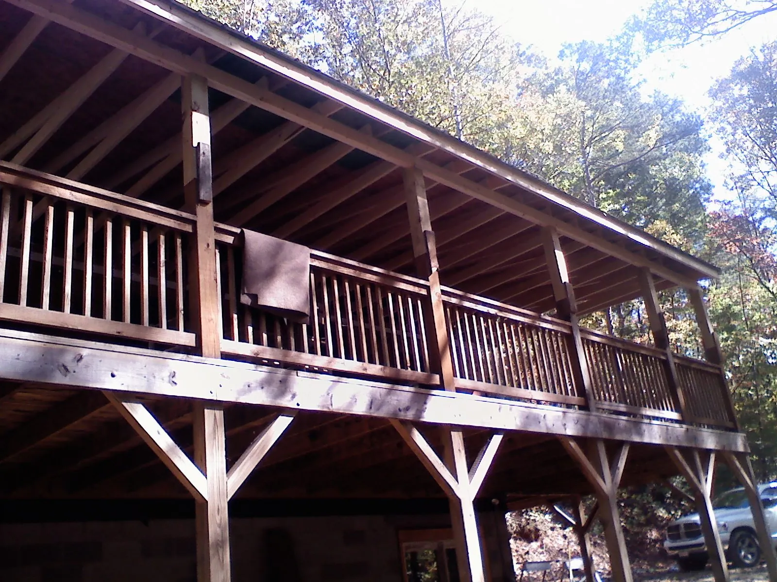 Timber framing under a new elevated porch and deck — Roof Leak Repair in Laredo by Roofing Brothers